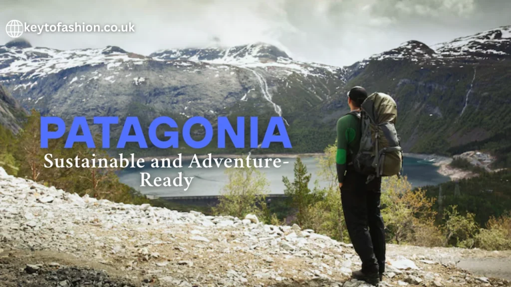 The Best Outdoor Brands Like Patagonia Ethical Sustainable and Adventure-Ready 1 A person with a large backpack stands on a rocky trail, looking out at a stunning mountain landscape with a lake in the valley. The text "PATAGONIA Sustainable and Adventure-Ready" is overlaid on the image.