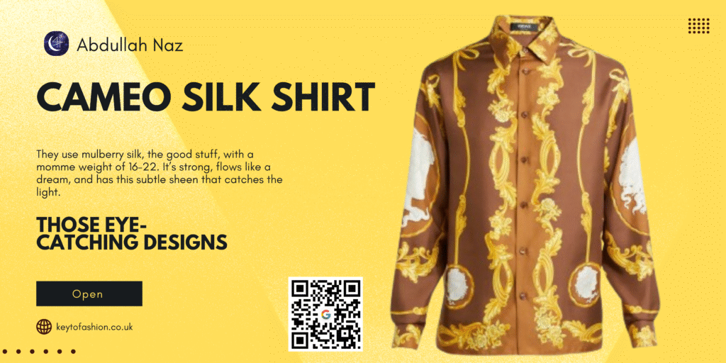 Why You’ll Love a Cameo Silk Shirt 1 A luxurious brown silk shirt with intricate gold and white cameo designs is displayed against a yellow background.